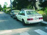 Coches en la calle Las Rosas